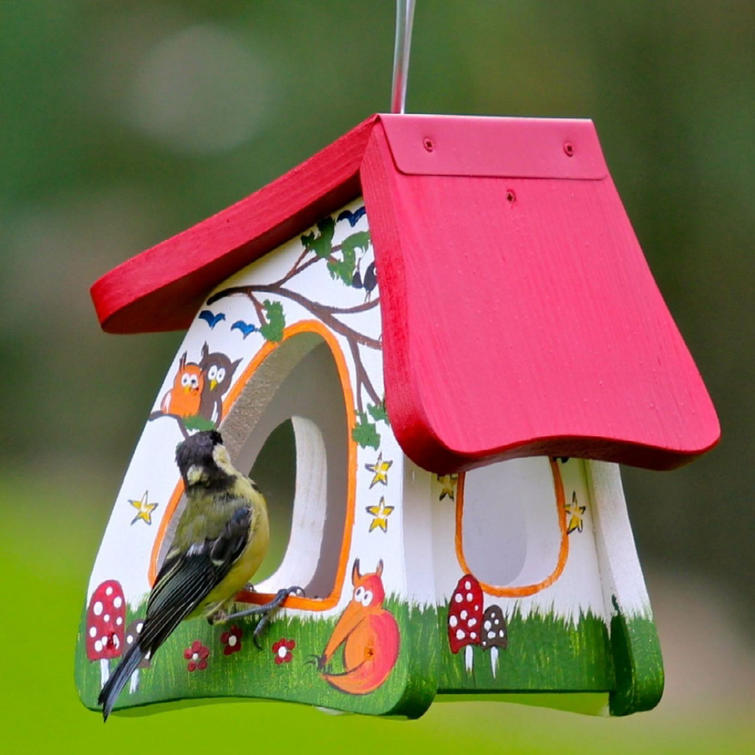 Vogelfutterhaus hängend mit Meise