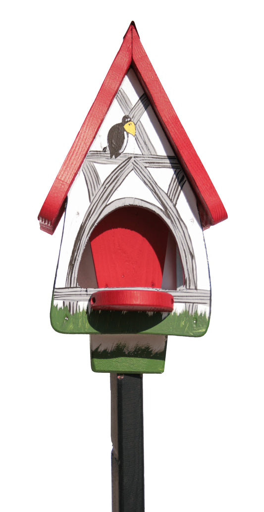 Small half-timbered white feeding villa 